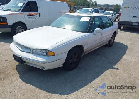 1996 Pontiac Bonneville Se z USA, uszkodzony, nr VIN 1G2HX52K0T4203448